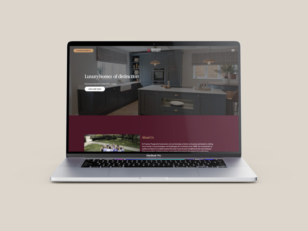 The Truelove website displayed on a laptop screen